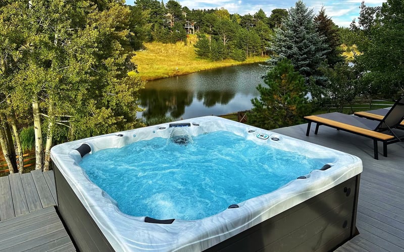 Hot tub on the deck — Evergreen Mountain House