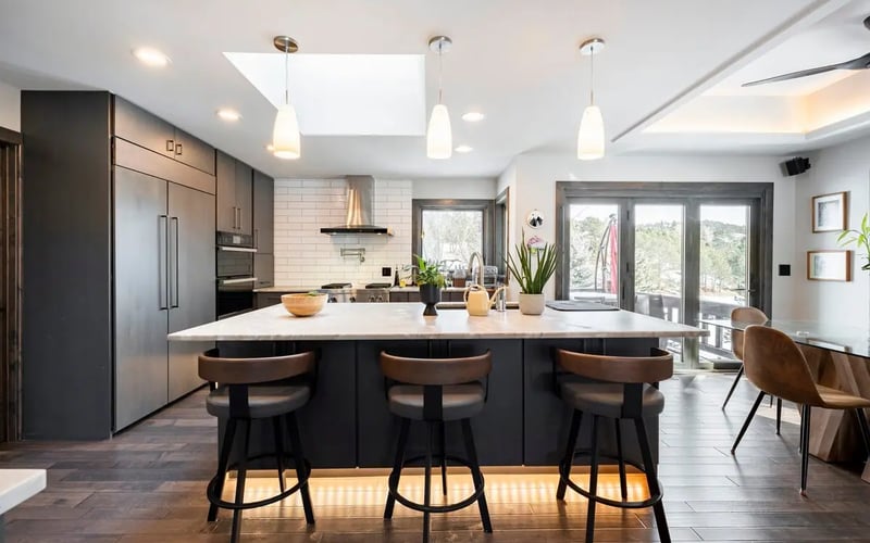 Kitchen island and bar seating — Evergreen Mountain House
