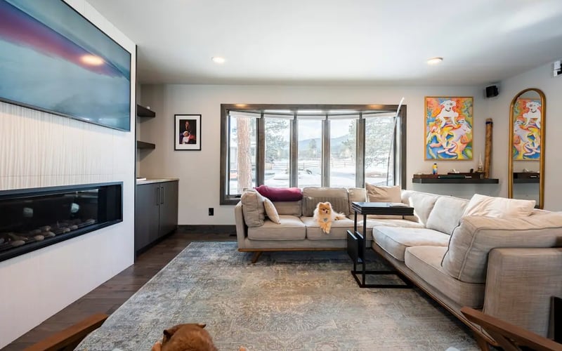 Living room with mountain views — Evergreen Mountain House