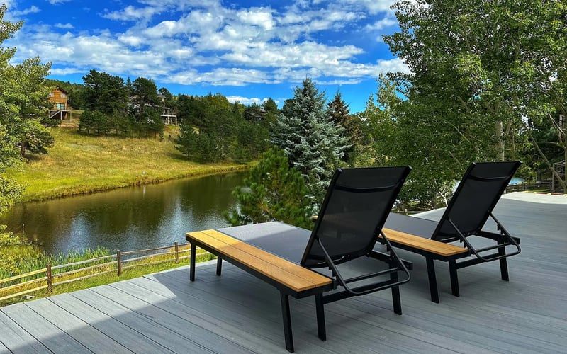 Deck overlooking the pond — Evergreen Mountain House