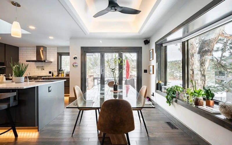 Dining by the windows — Evergreen Mountain House